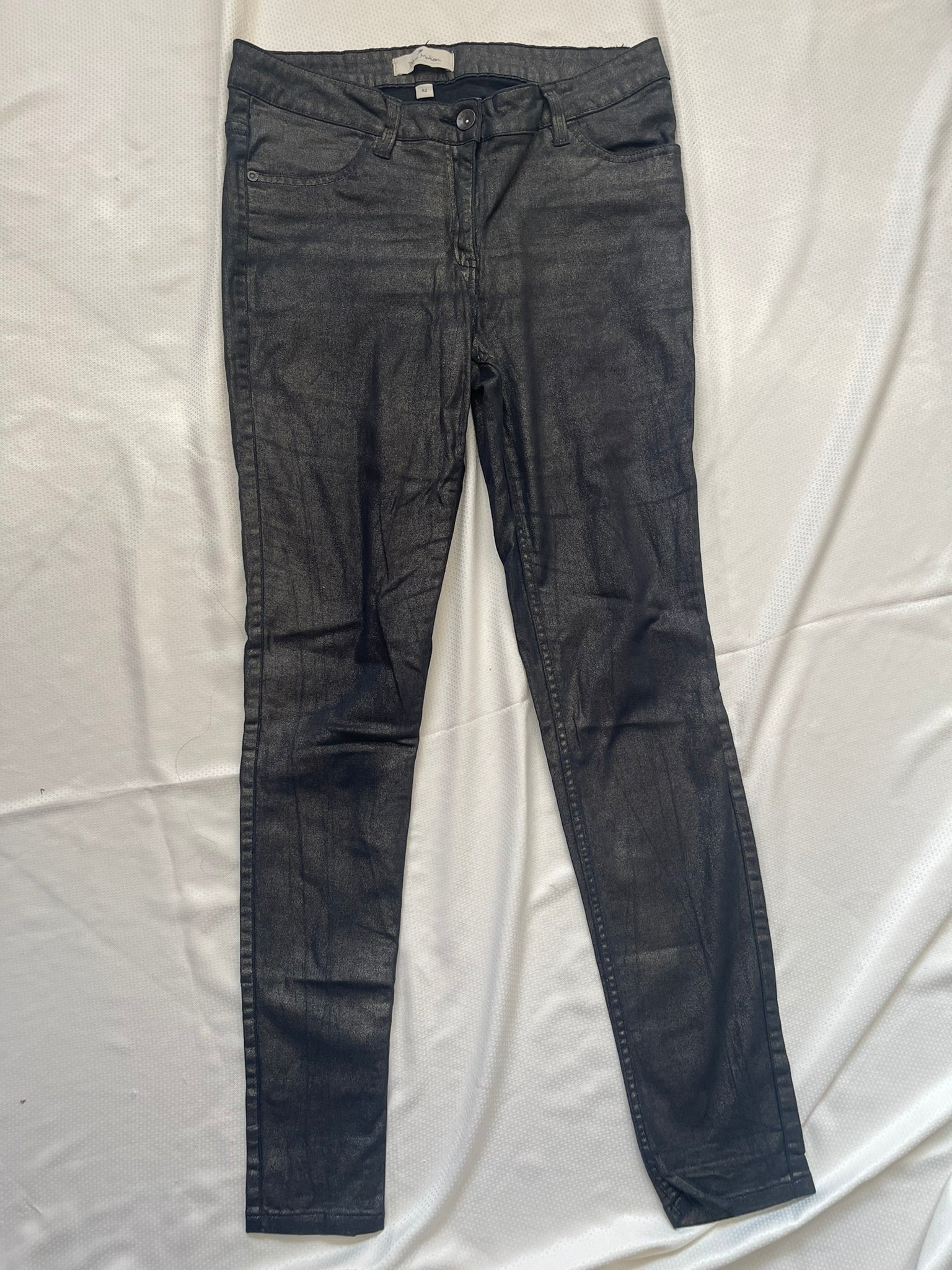 Jean skinny noir enduit à reflets femme