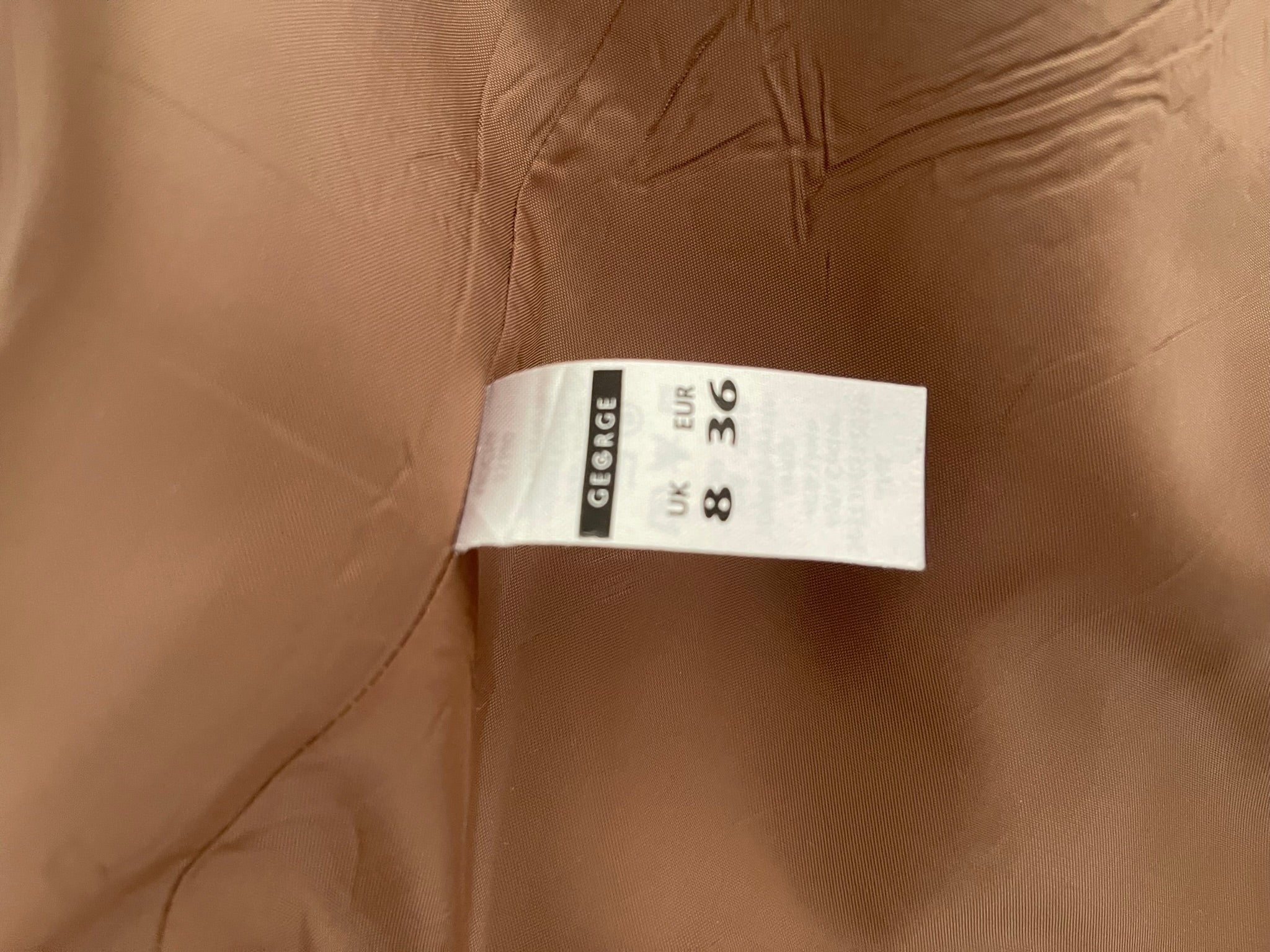 Veste courte marron à grands boutons