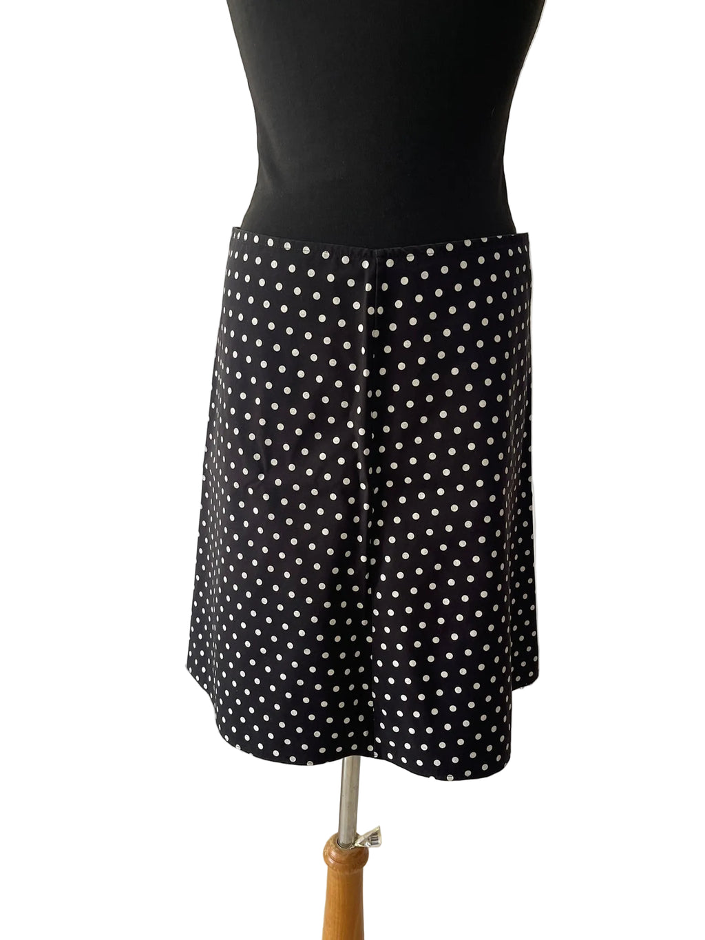Jupe trapèze noire à pois blancs