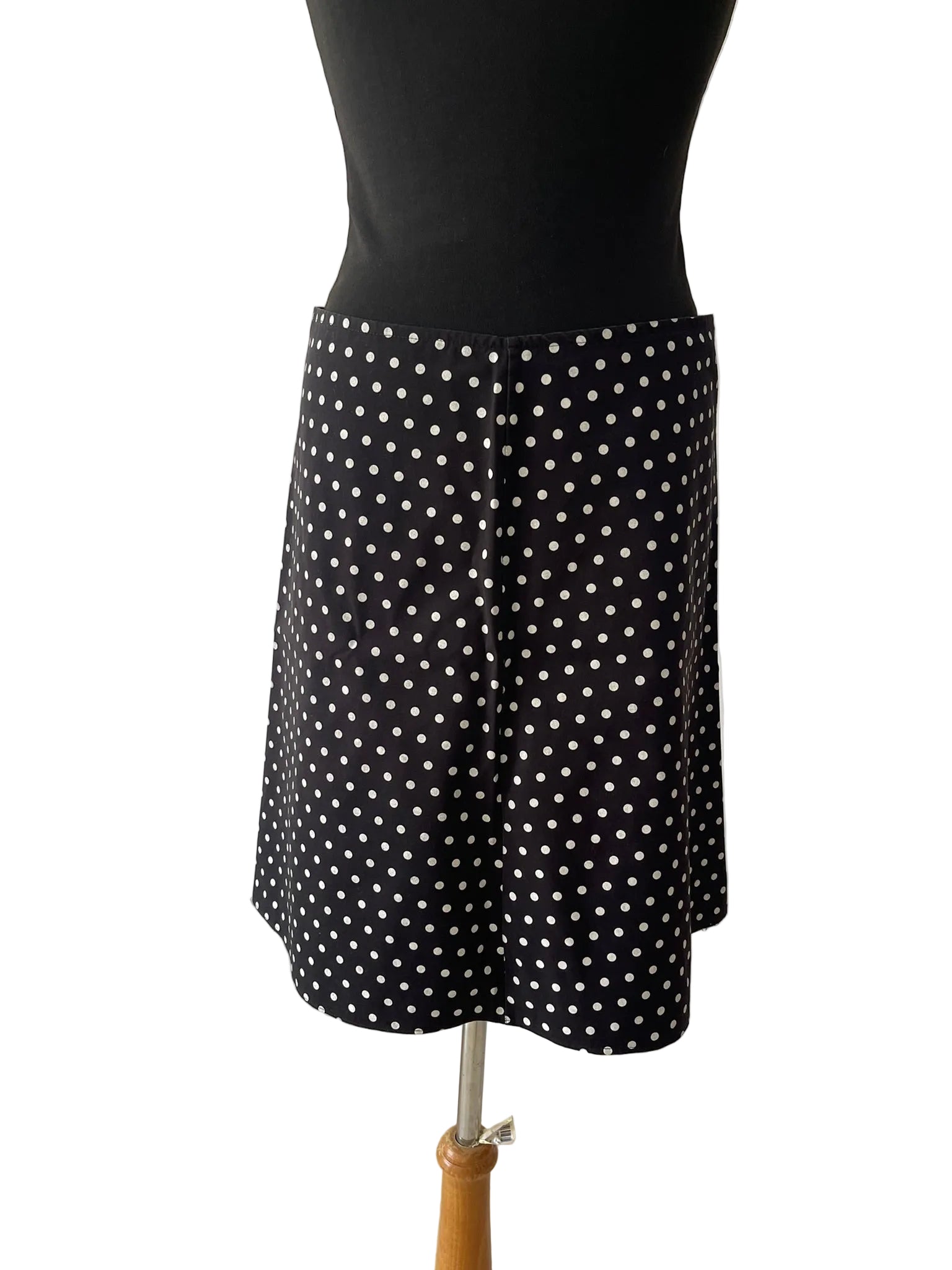 Jupe trapèze noire à pois blancs