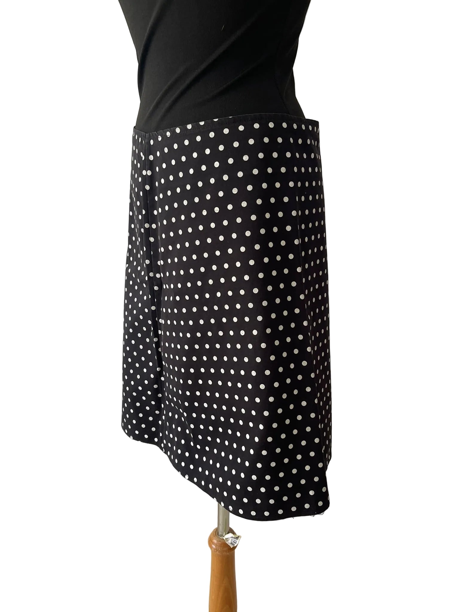 Jupe trapèze noire à pois blancs