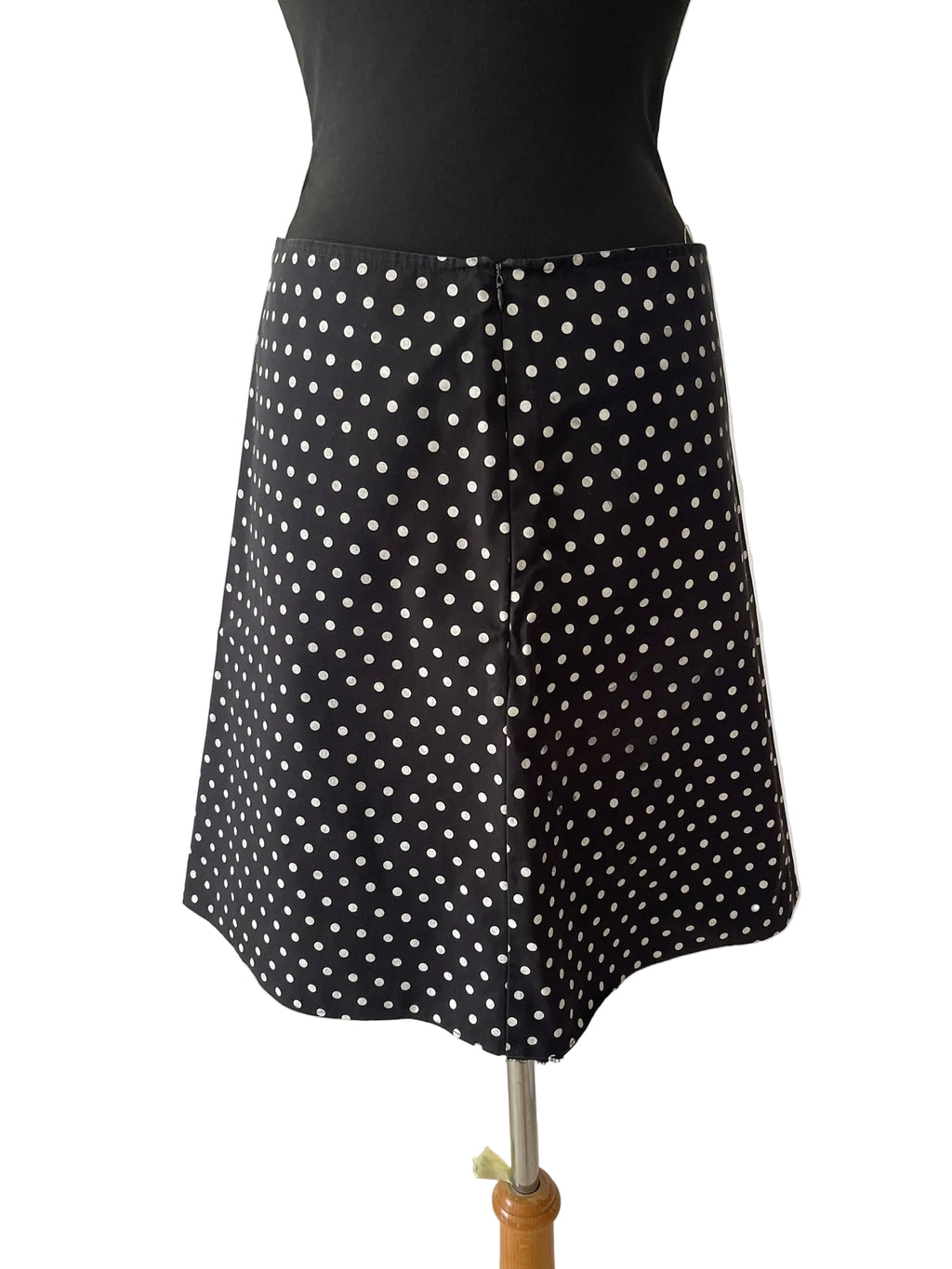 Jupe trapèze noire à pois blancs