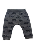 Pantalon jogging bébé gris chiné imprimé masques superhéros noirs