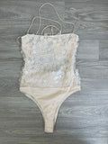 Bustier ivoire à sequins fleuris et bretelles fines