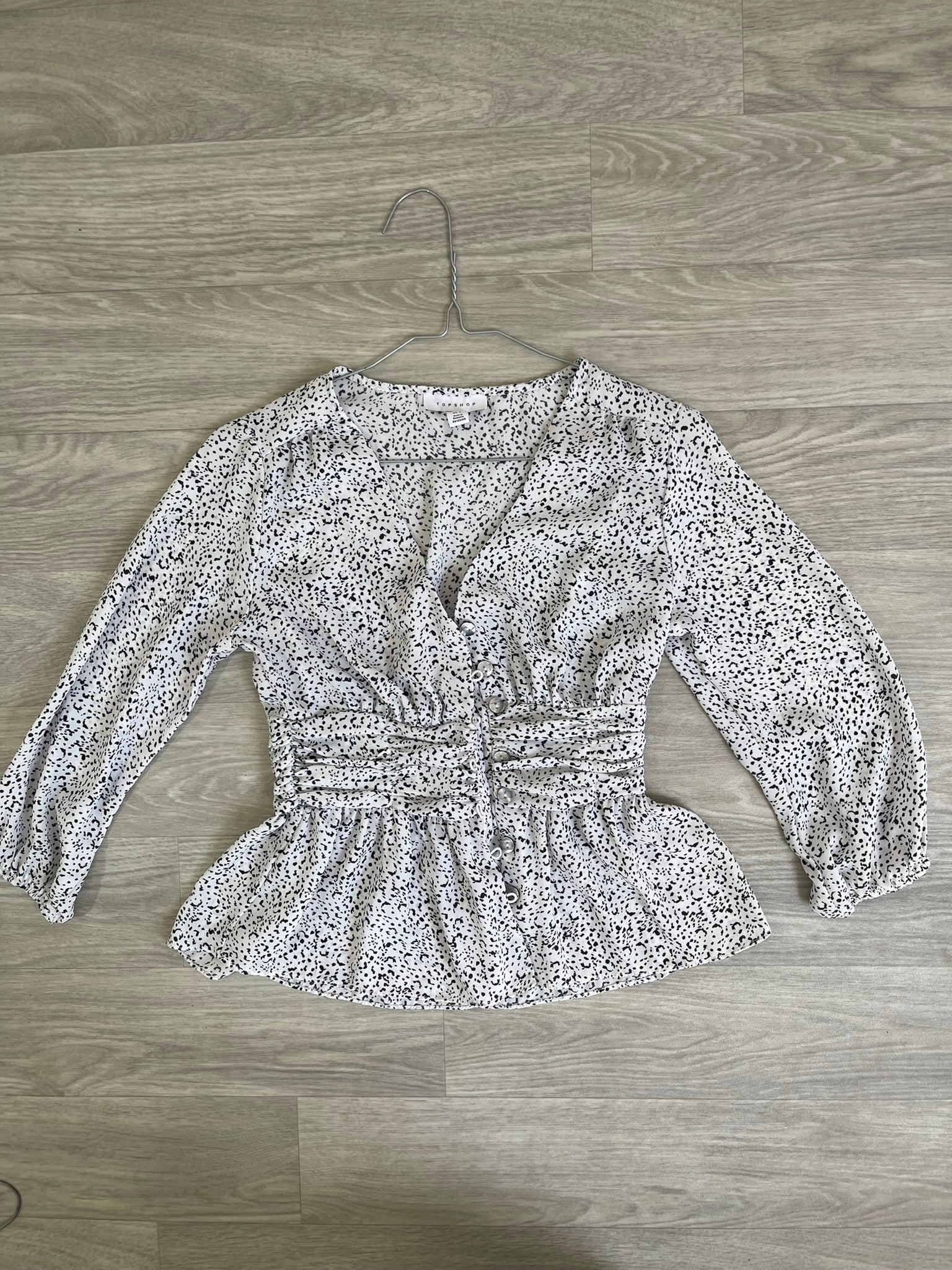 Blouse péplum blanche à pois noirs XS