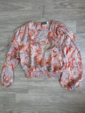 T-shirt rose imprimé graphique noué