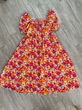 Robe fleurie corail, orange et fuchsia, manches bouffantes