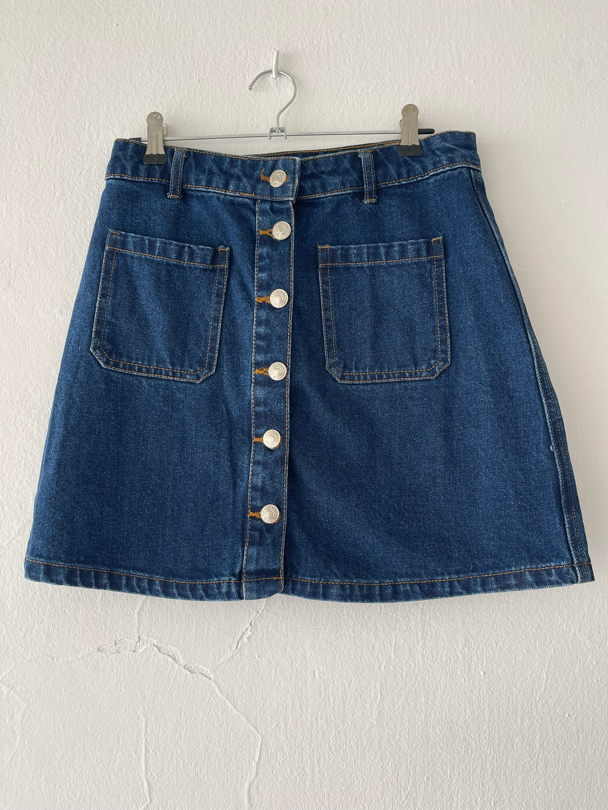 Jupe en jean bleu foncé à boutons pression et poches Taille 36