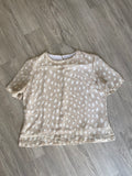 Haut à pois beige et blanc