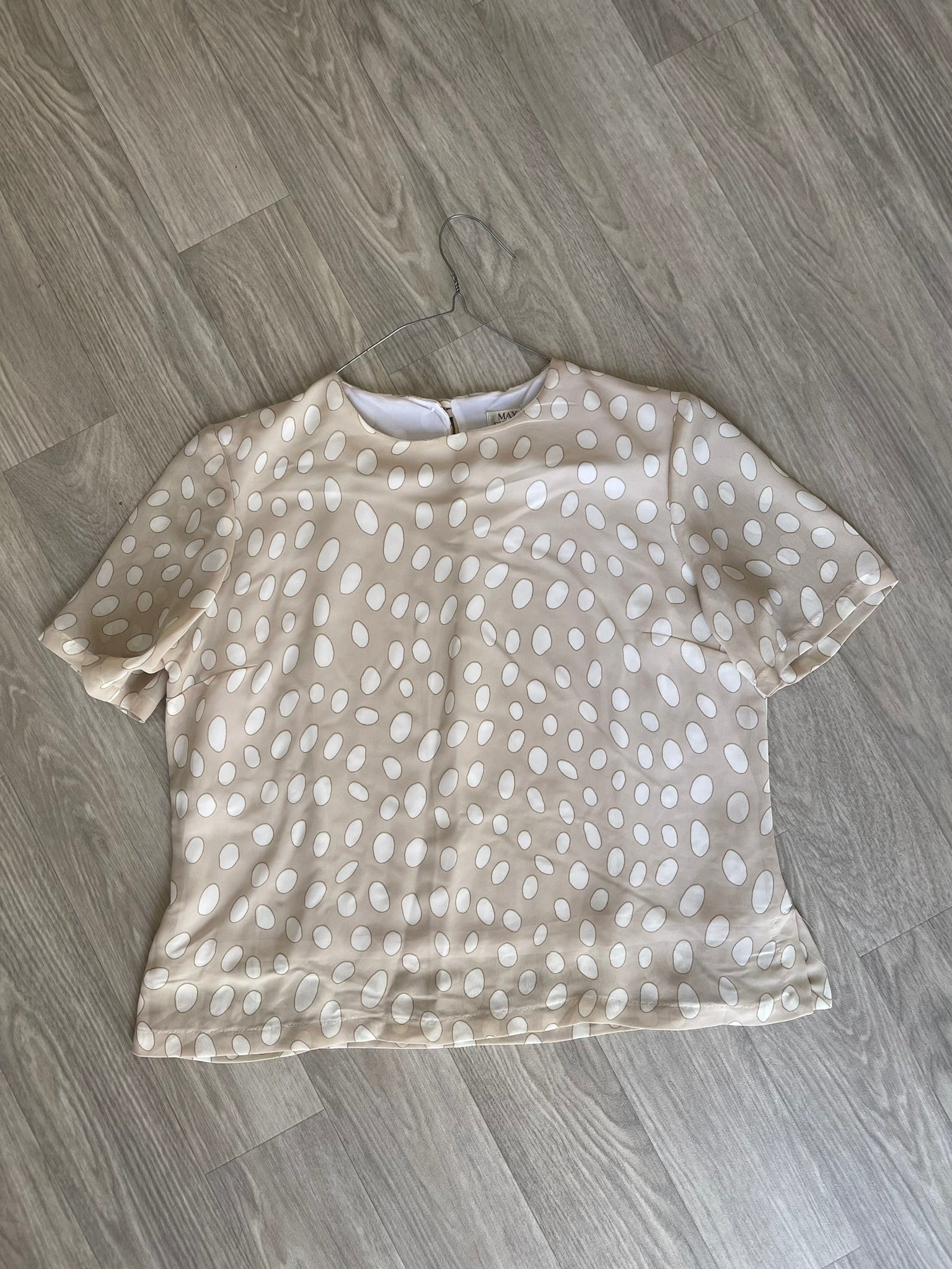 Haut à pois beige et blanc