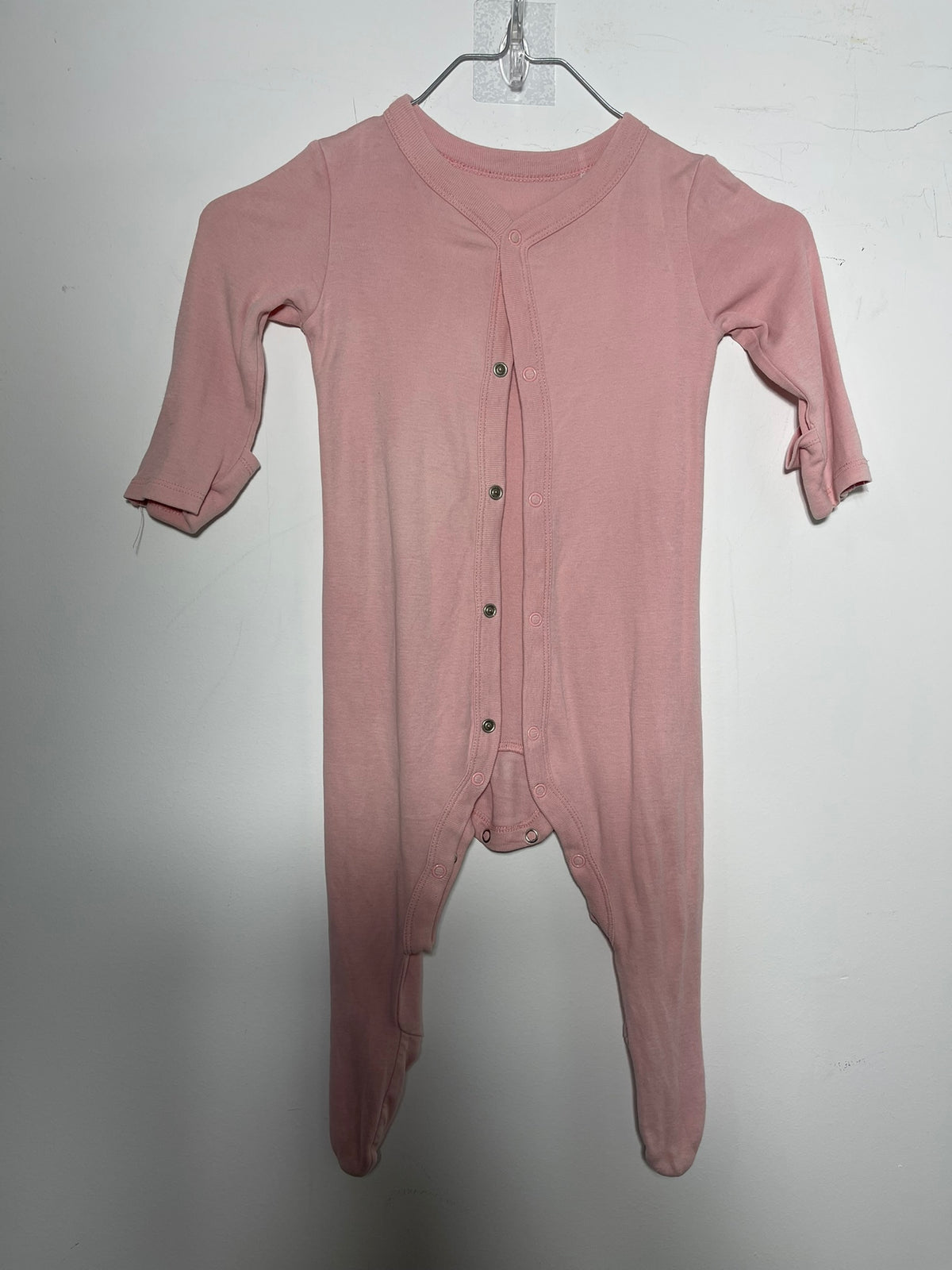 Pyjama rose pâle à pieds