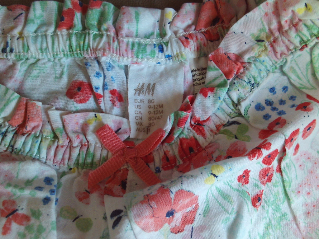 Short fleuri corail et vert fille