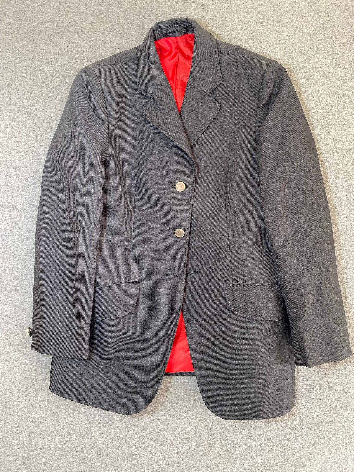 Veste d'équitation noire doublure rouge