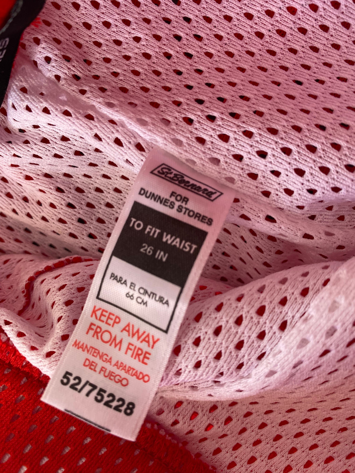 Pantalon large en mesh rouge à bandes blanches