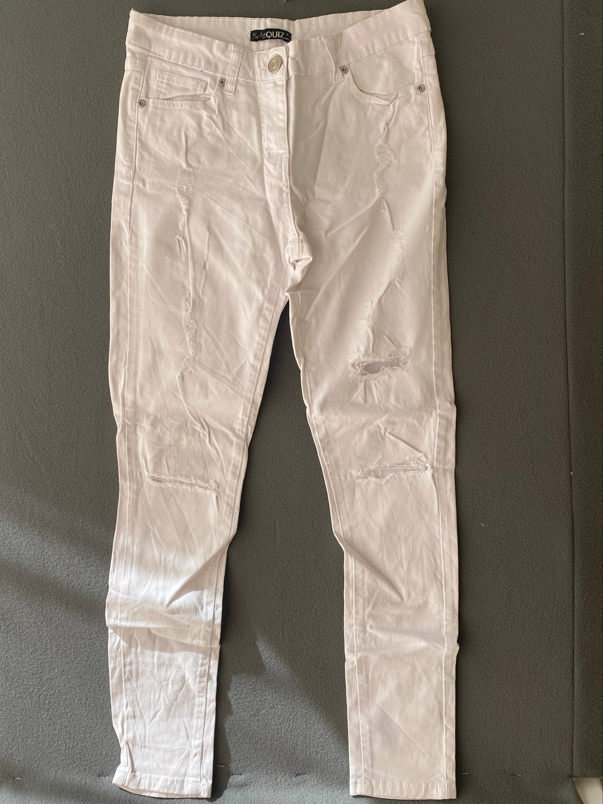 Jean skinny blanc déchiré Quiz