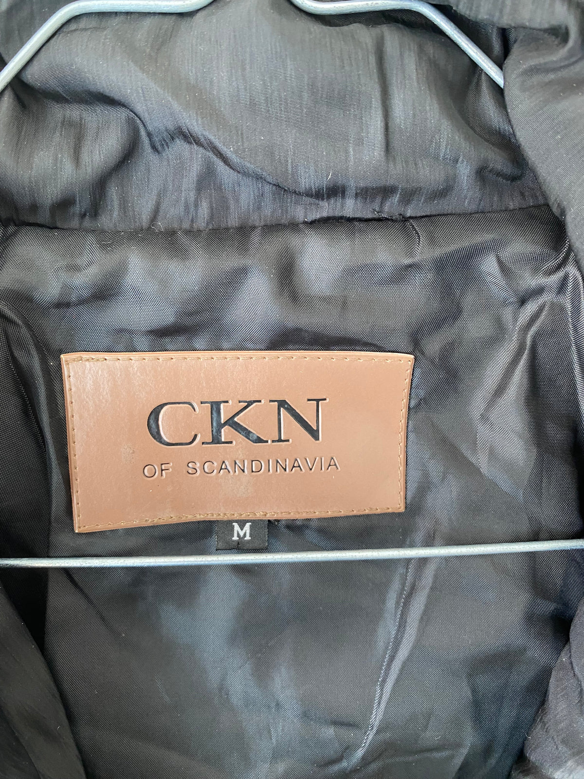 Veste matelassée noire en losanges
