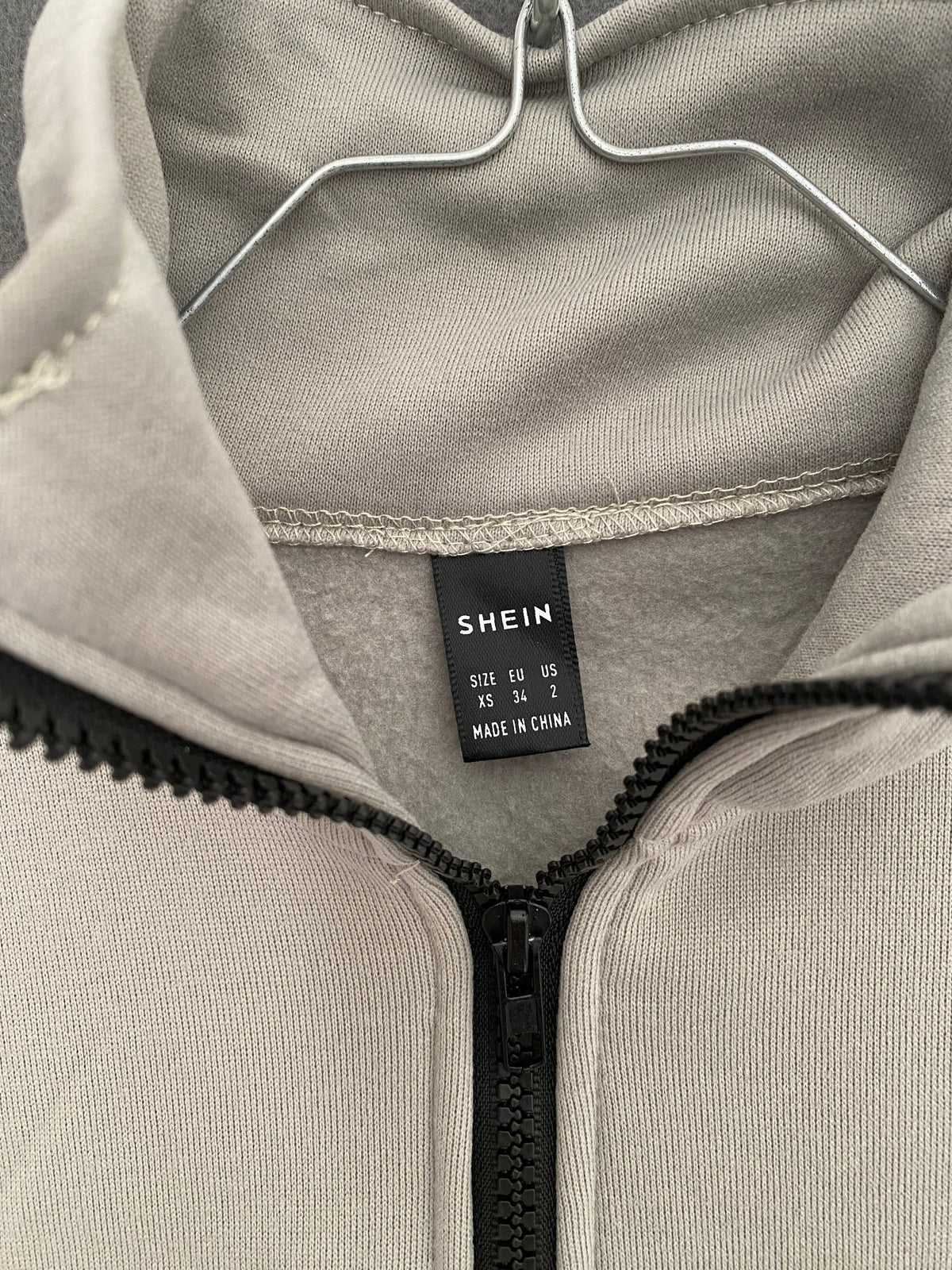 Sweat court demi-zip gris clair