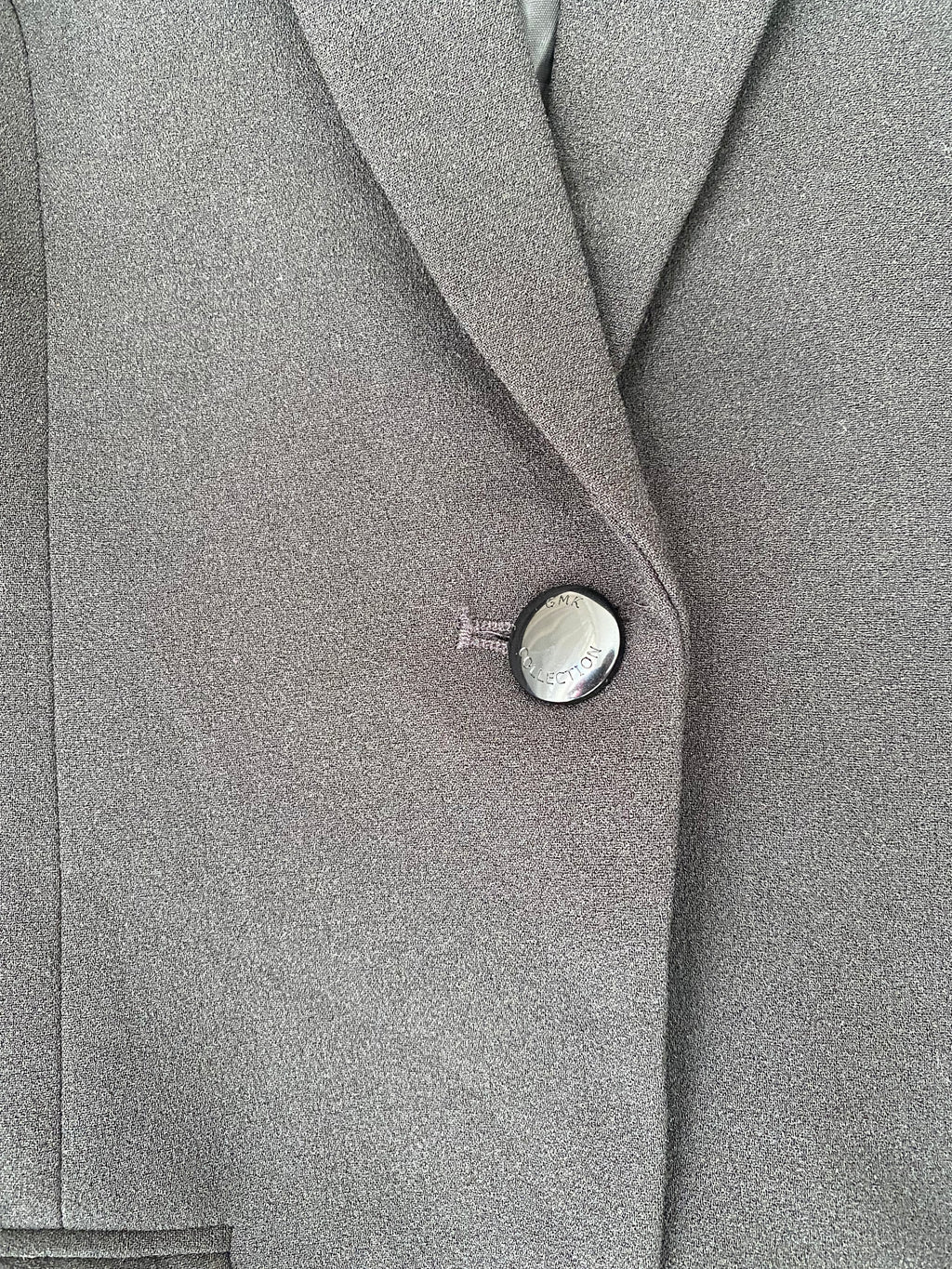 Blazer noir à col châle et un bouton