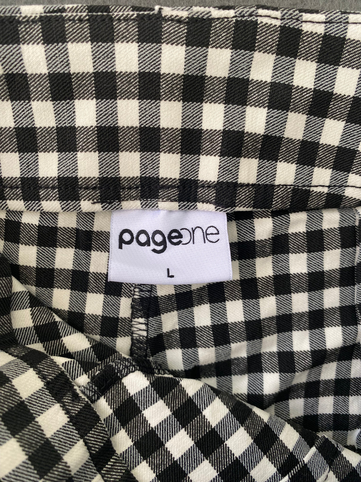 Pantalon vichy noir et blanc zippé sur le côté