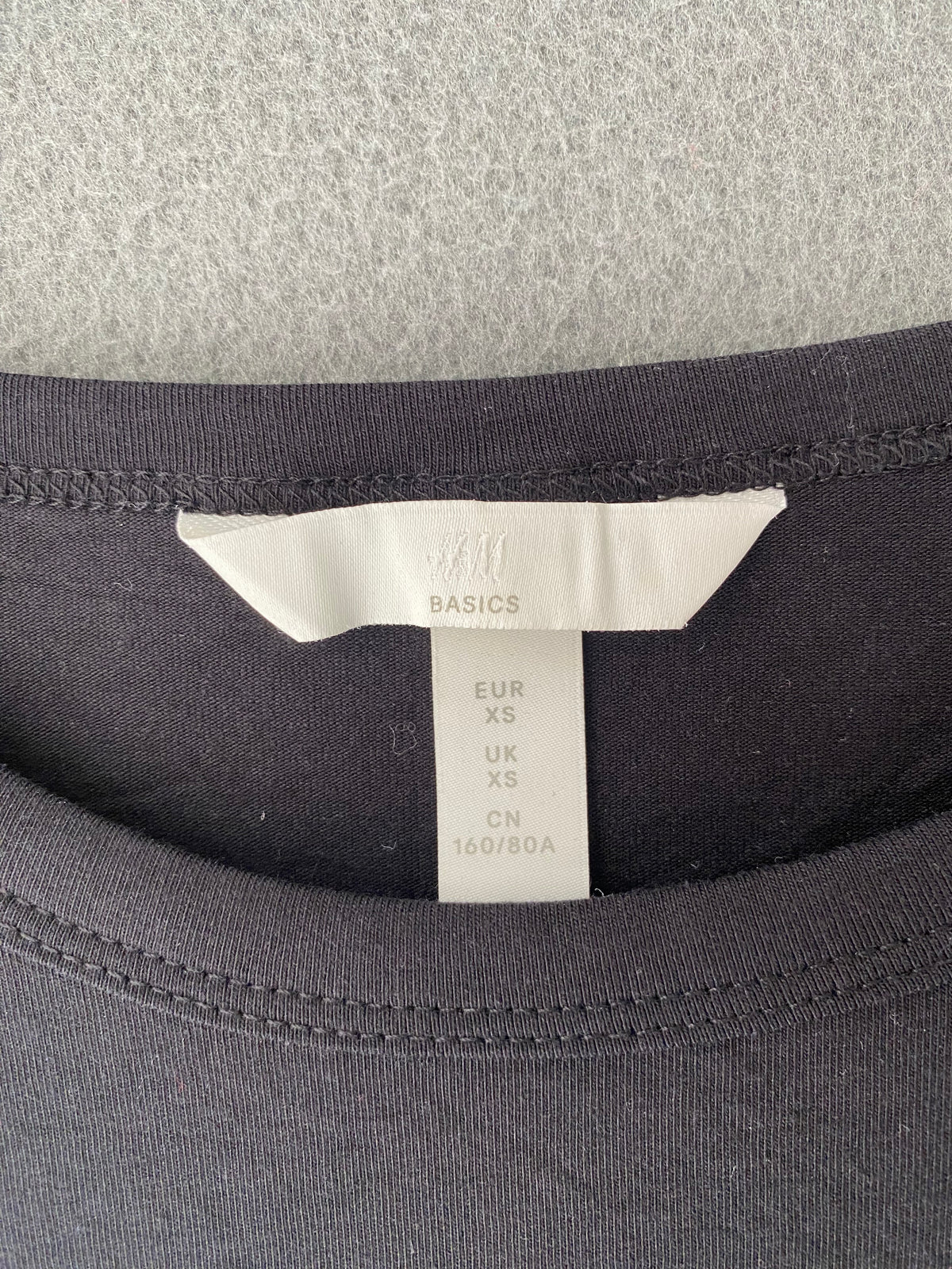 Robe moulante noire en jersey à manches longues