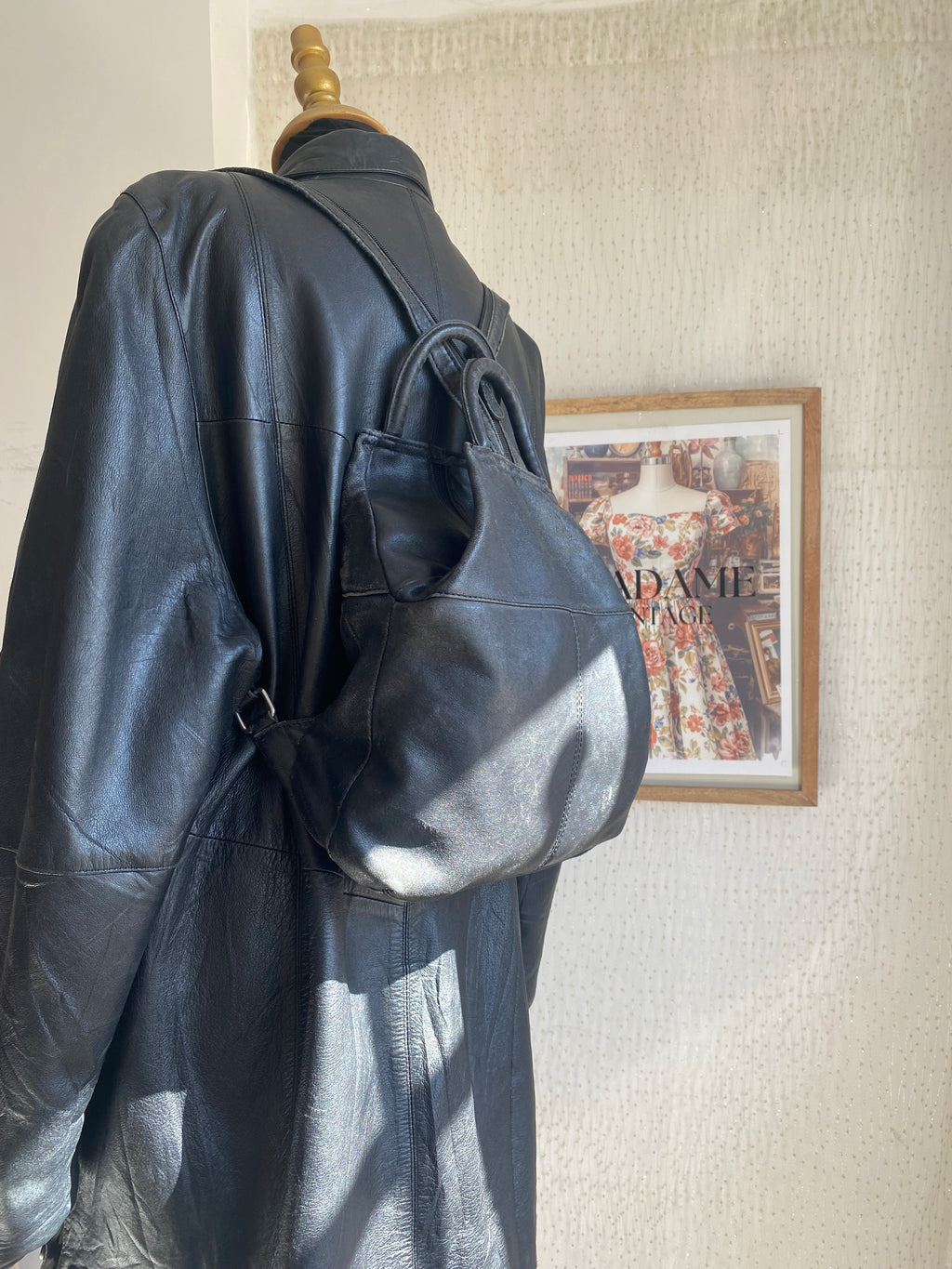 Vintage black leather mini backpack