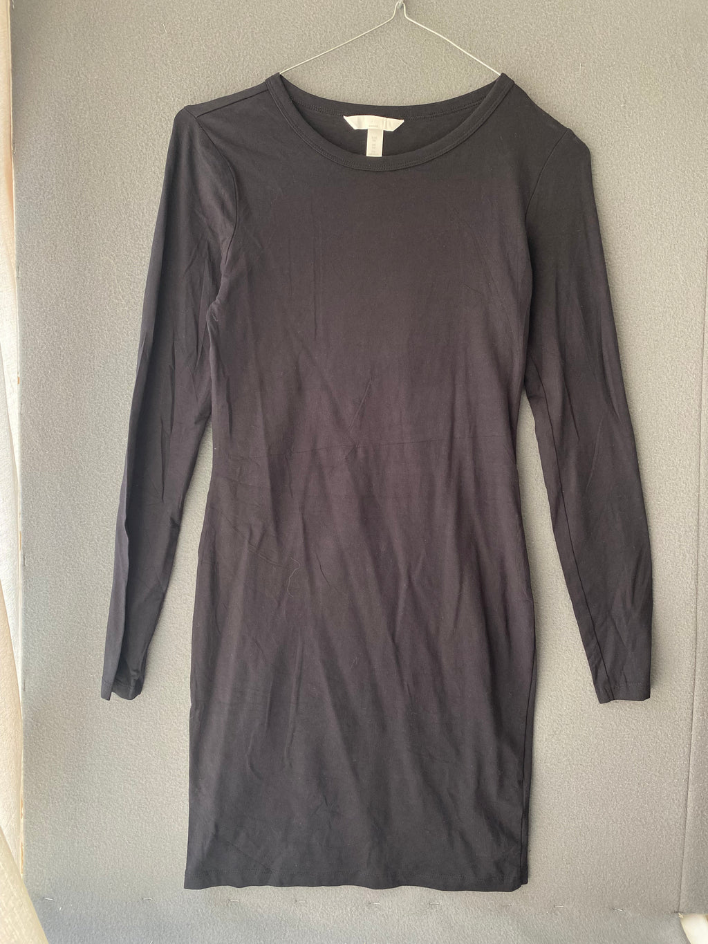 Robe moulante noire en jersey à manches longues