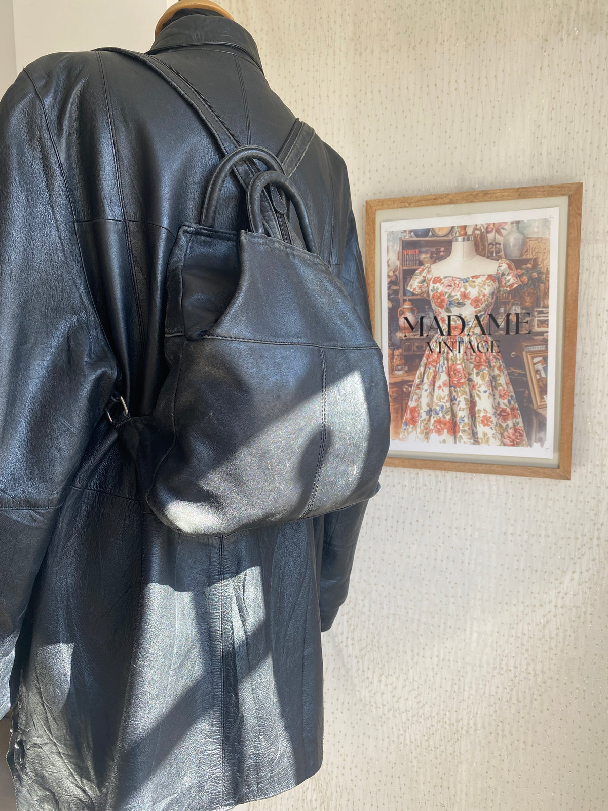 Vintage black leather mini backpack