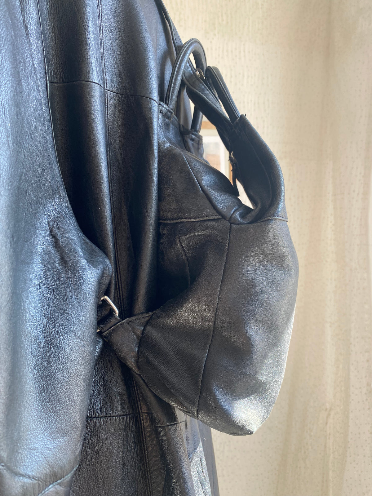 Vintage black leather mini backpack
