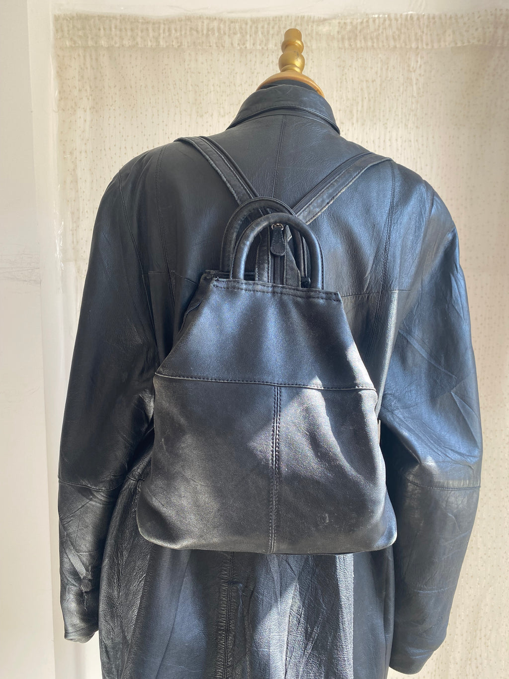 Vintage black leather mini backpack