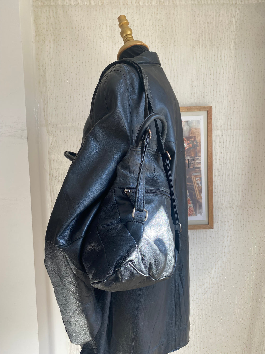 Vintage black leather mini backpack