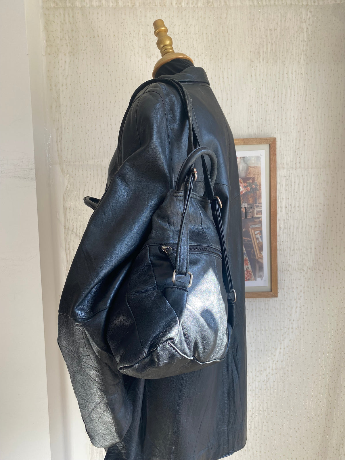Vintage black leather mini backpack