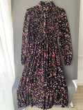 Robe longue noire à confettis et smocks