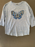 Pull bleu chiné papillon sequins