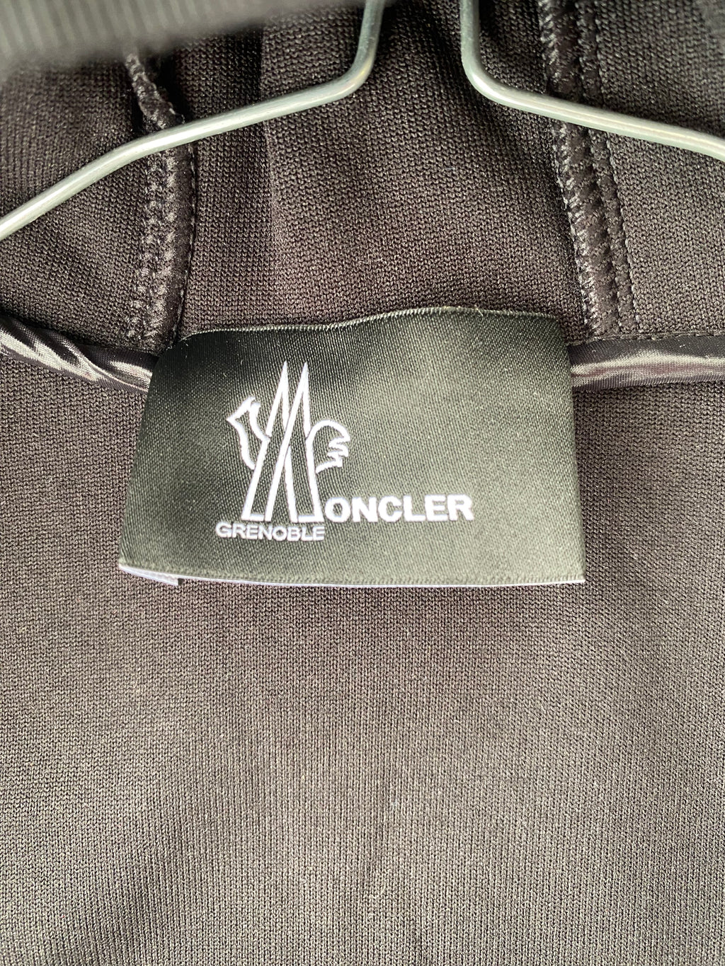 Veste polaire noire à capuche bi-matière