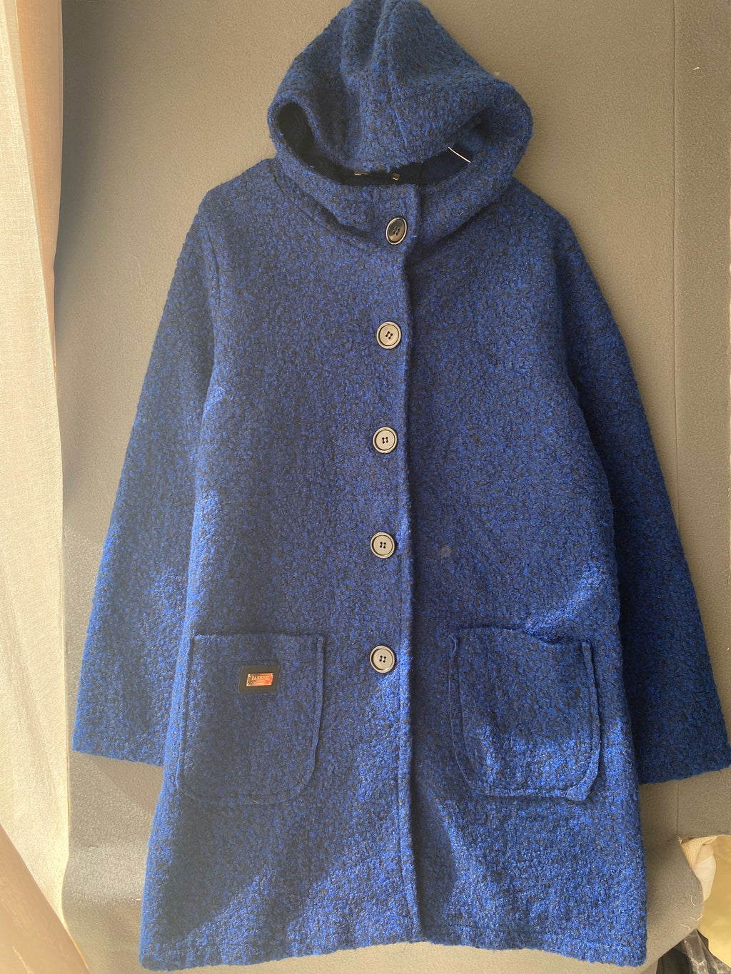 Manteau à capuche en bouclette bleu roi