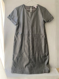 Robe en simili cuir noire à manches courtes et poches