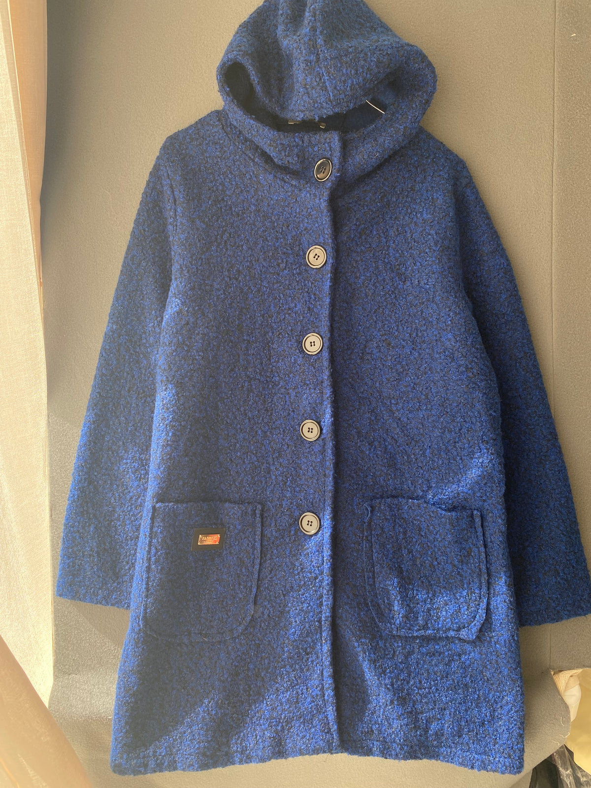 Manteau à capuche en bouclette bleu roi