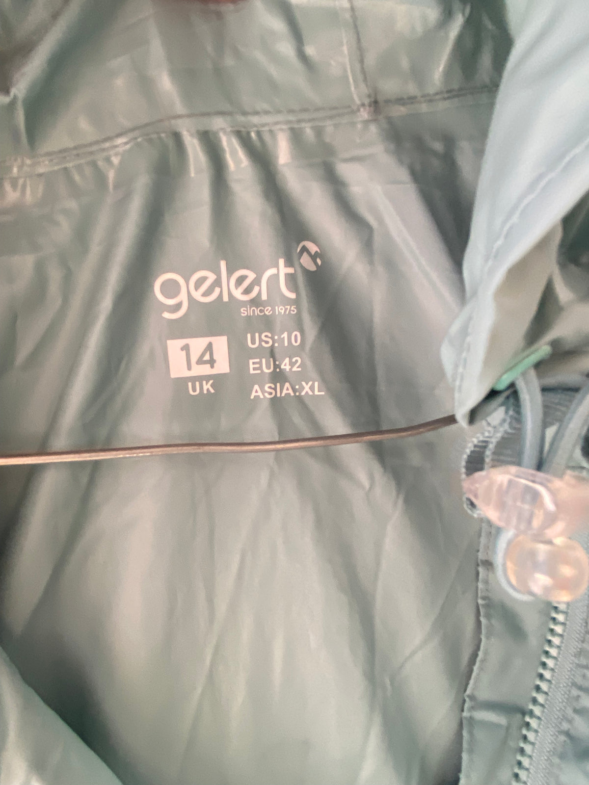 Veste de pluie à capuche vert menthe