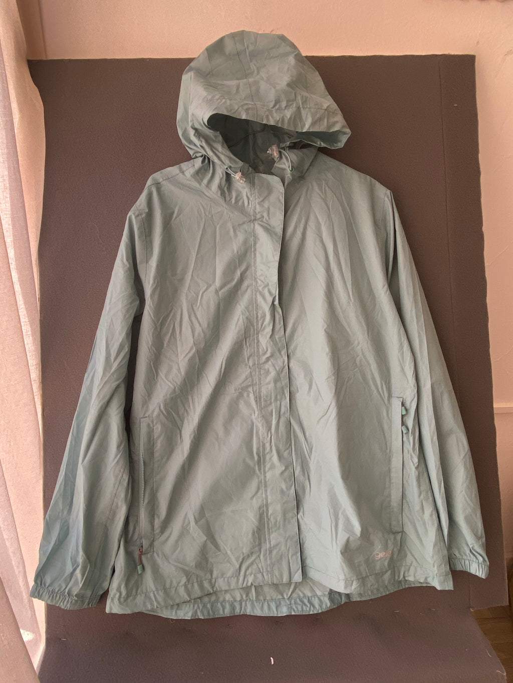 Veste de pluie à capuche vert menthe