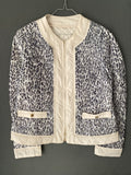 Veste matelassée imprimé léopard gris et crème