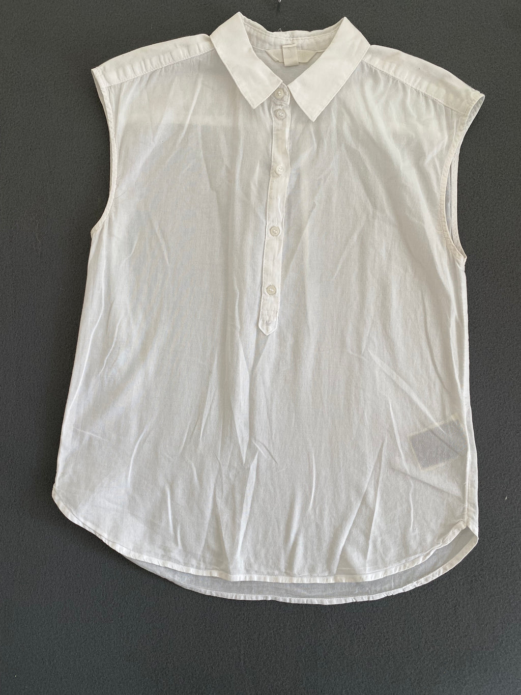 Blouse sans manches blanche en coton léger