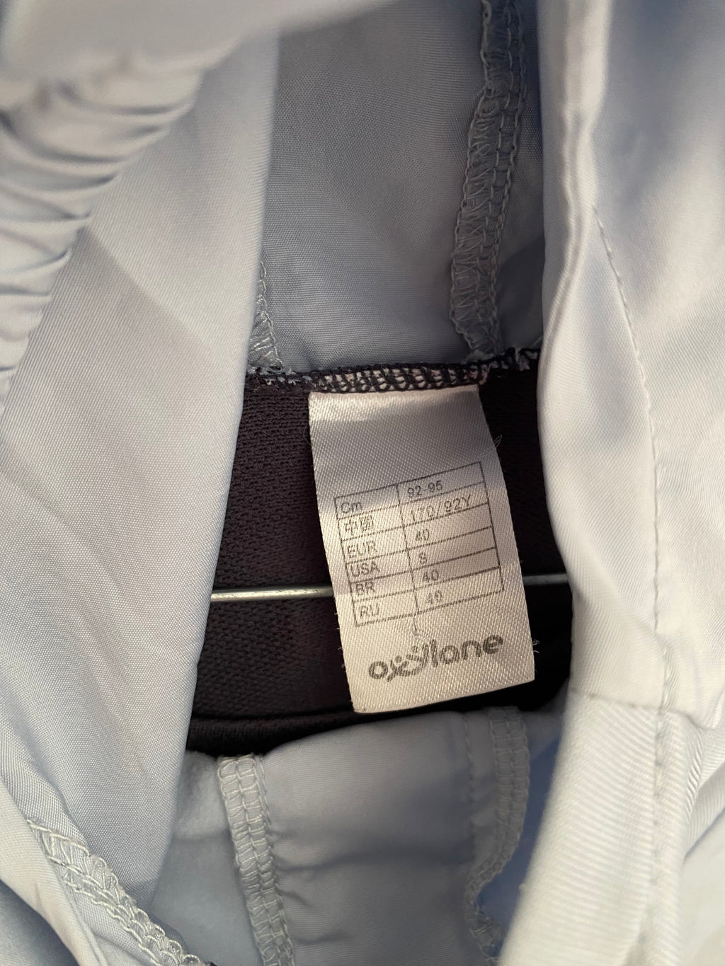 Veste de running à capuche gris noir et rose