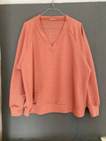 Pull col V terracotta texturé