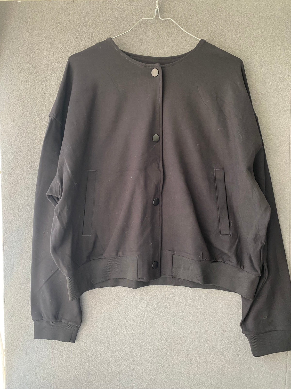 Bomber noir en molleton à boutons-pression