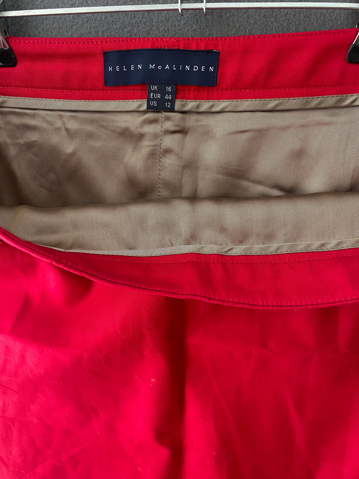 Jupe droite rouge à galon beige