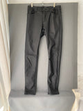 Pantalon noir enduit slim cinq poches