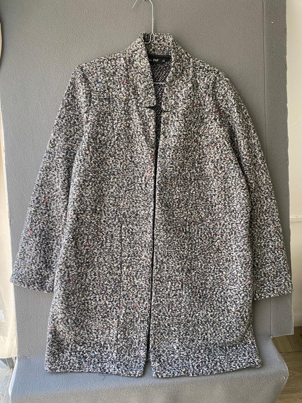 Manteau en bouclette gris moucheté