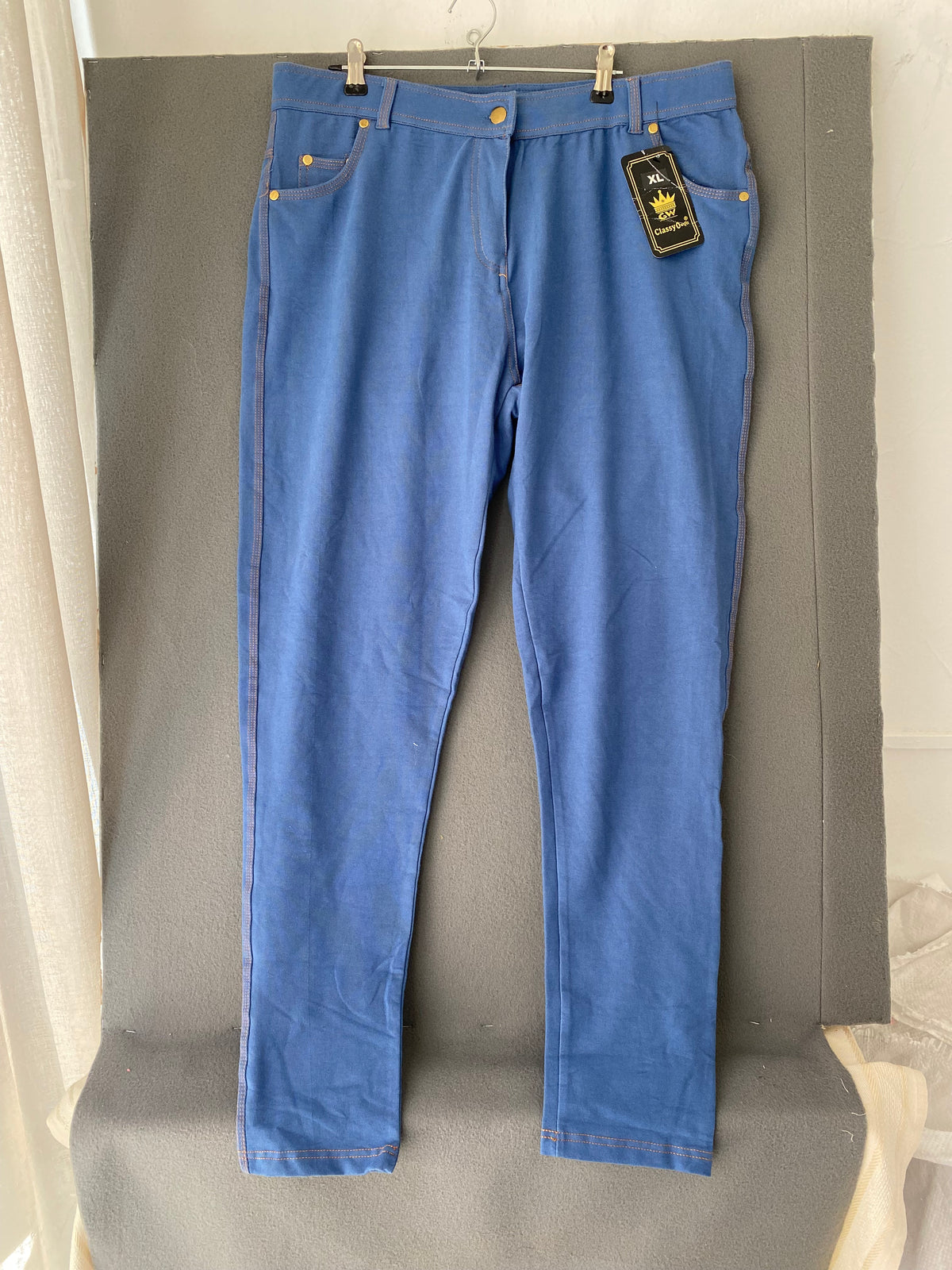 Jegging bleu effet jean à boutons dorés