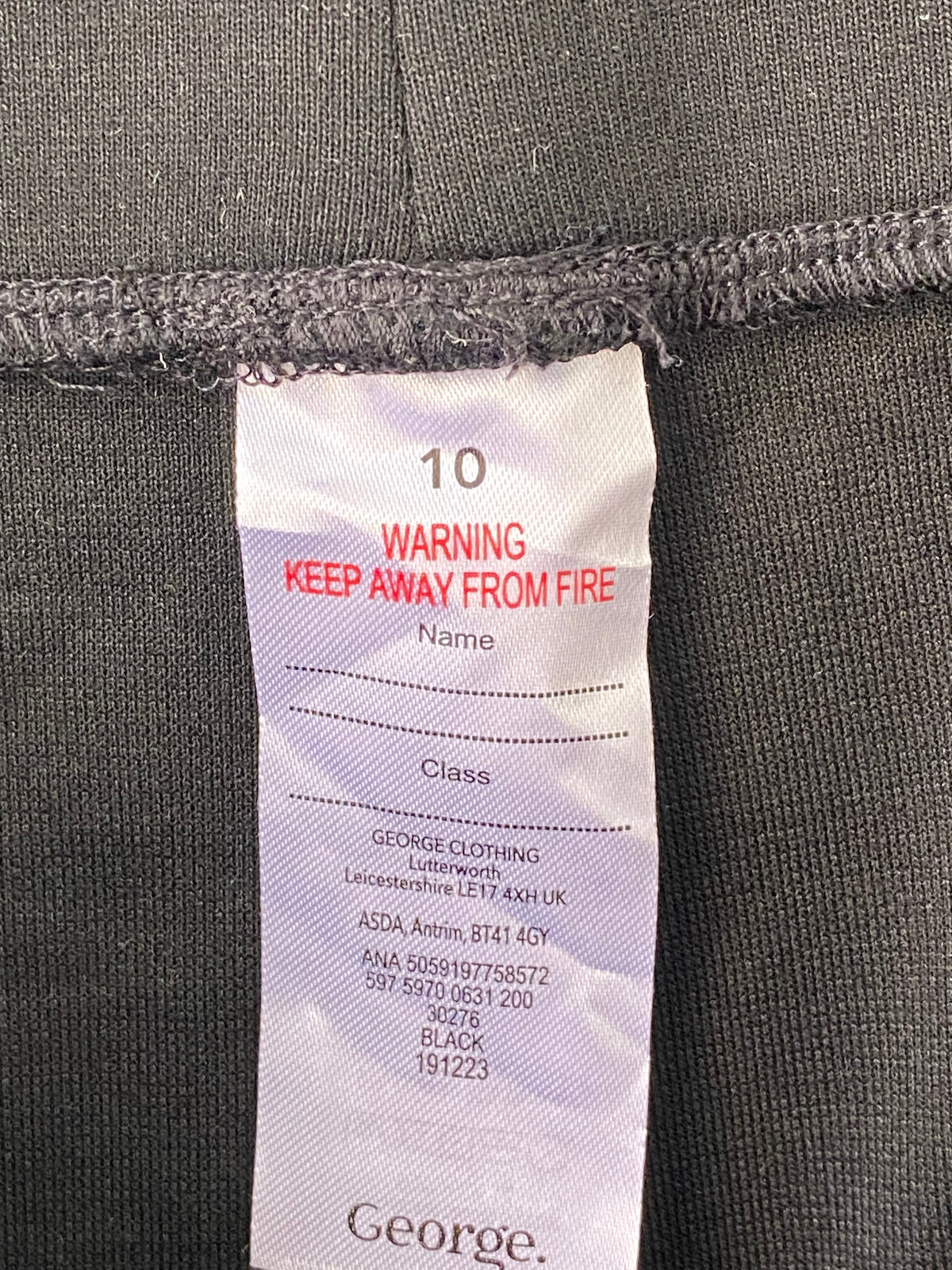 Pantalon évasé noir à fentes sur le devant