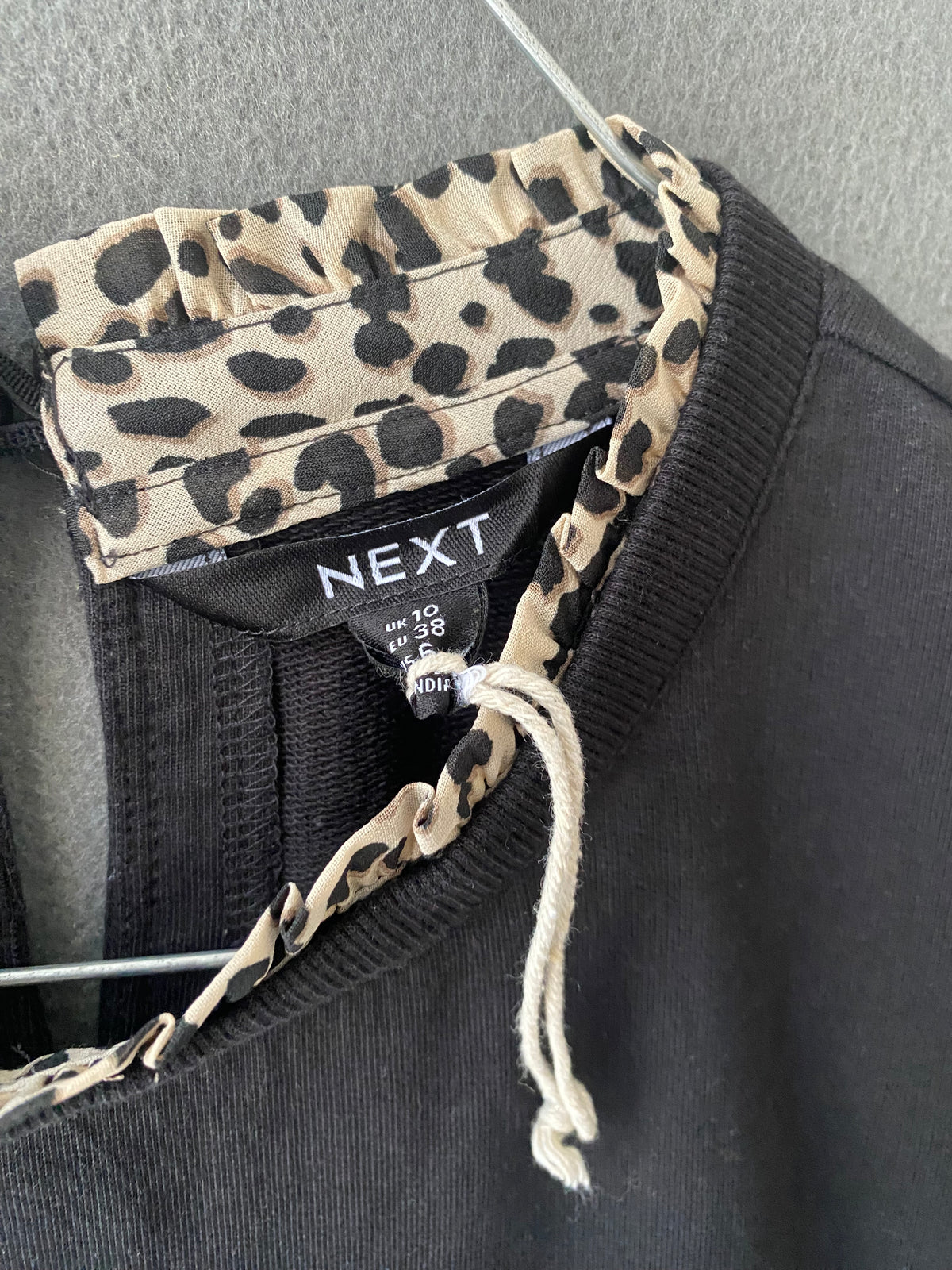 Robe sweat effet 2 en 1 noir et jupe léopard